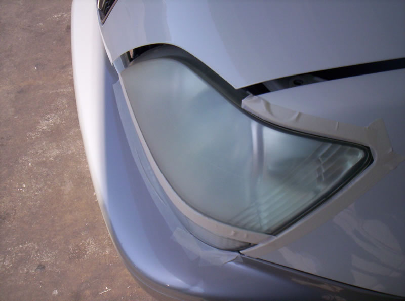 Lexus RX Headlights During Restoration Sanding Left Headlight View